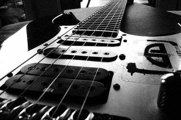 Black and white photo musical instruments electric guitar
