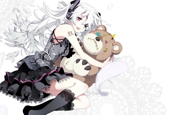 A girl with white hair and in a black dress hugs a toy bear