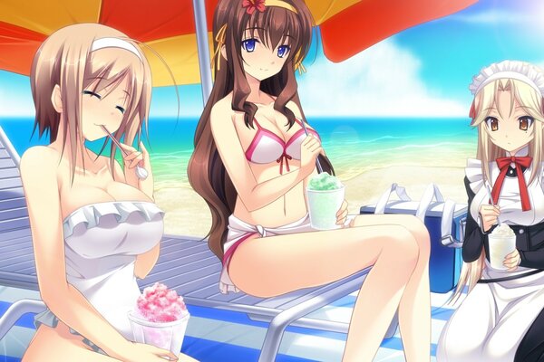 Two girls in swimsuits and a maid on the beach