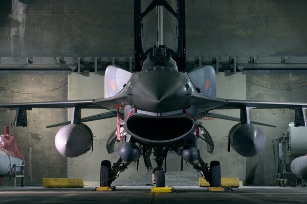 A beautiful grey plane with a sharp nose