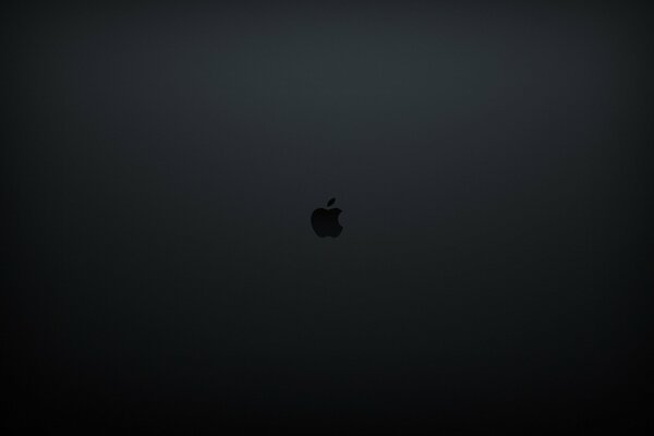 Logotipo de Apple-manzana mordida sobre un fondo oscuro