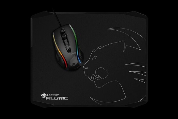 Gaming mouse on a black mat