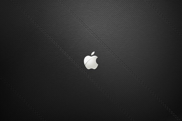 Логотип яблоко на чёрном текстурном фоне
