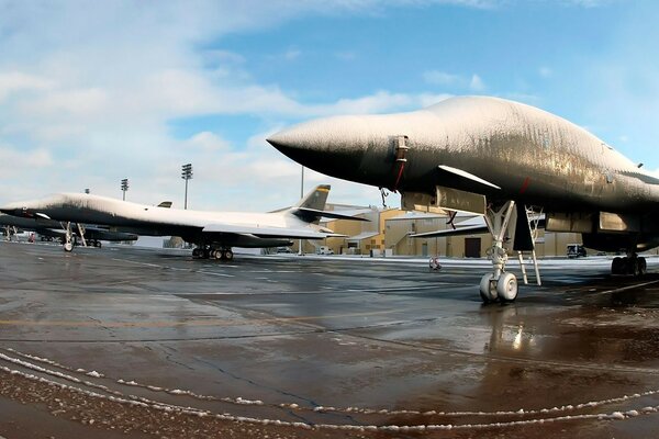 Parking of military aircraft. A little snow is visible