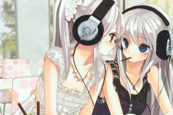 Two girls wearing headphones with long hair