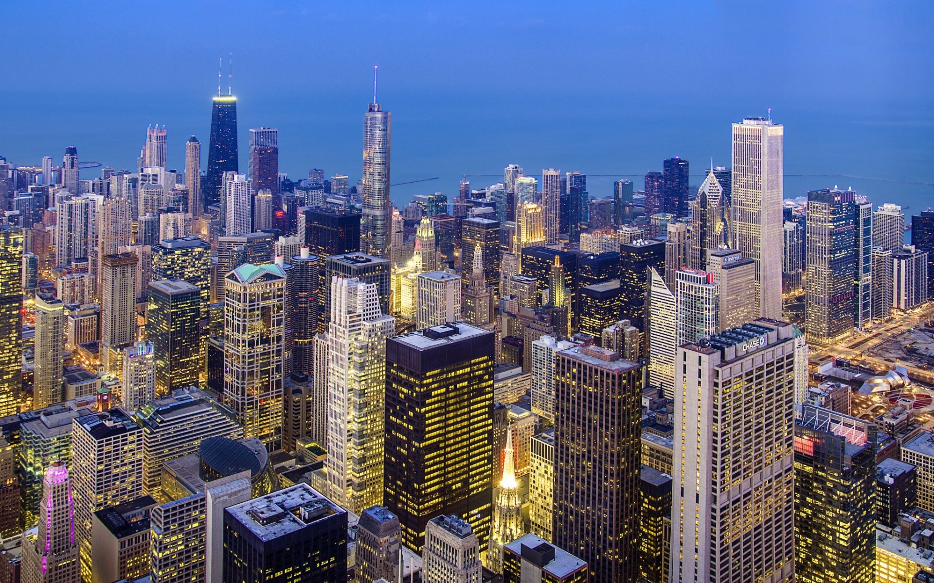 luces chicago estados unidos illinois rascacielos noche edificio ciudad iluminación árboles casas