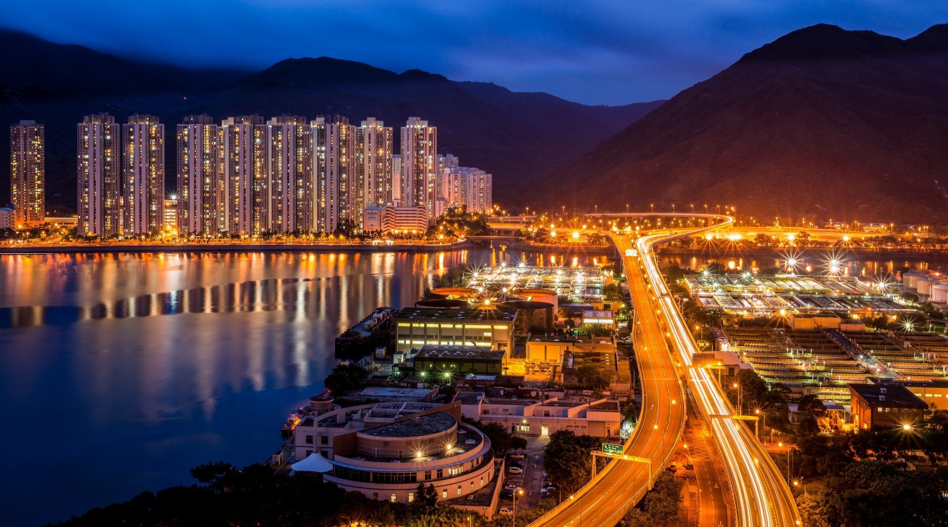 luces hong kong china rascacielos panorama carretera ciudad nocturna montañas