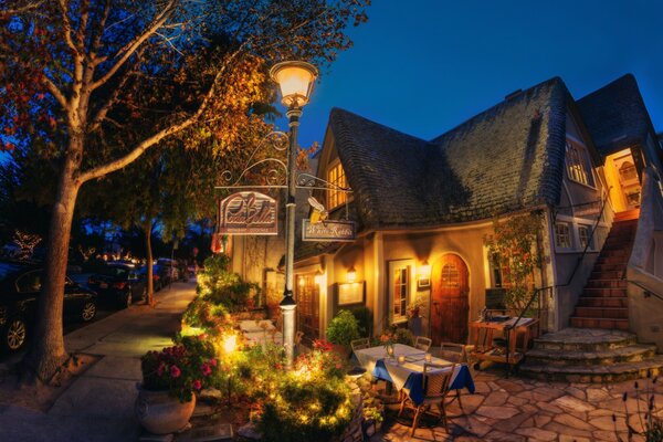 A house in California in the light of a lantern