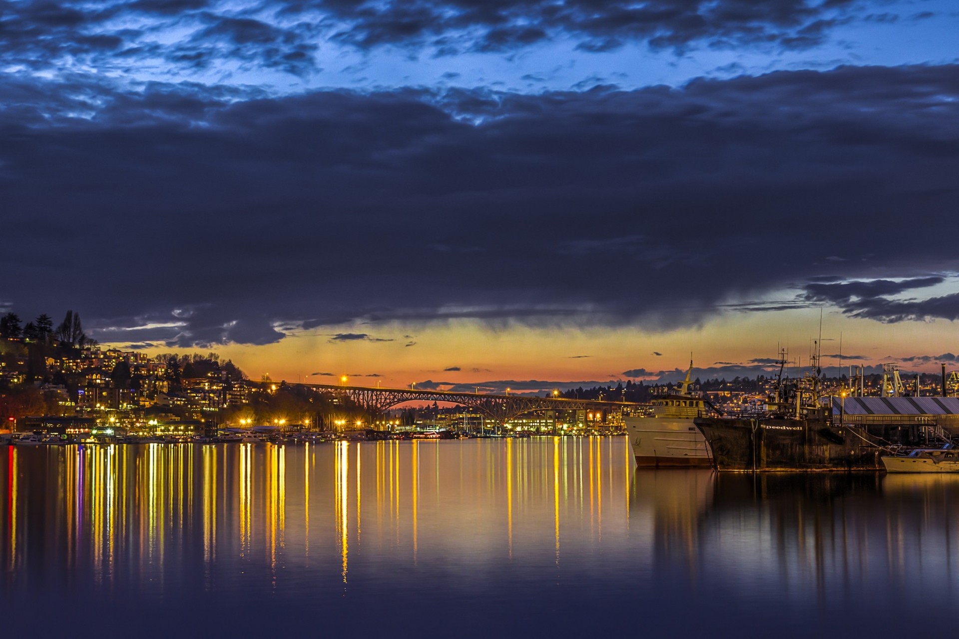 lights clouds united states sunset washington seattle town lake boat bridge embankment