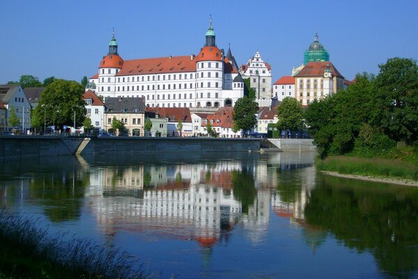 Reflection of buildings in the Danube River