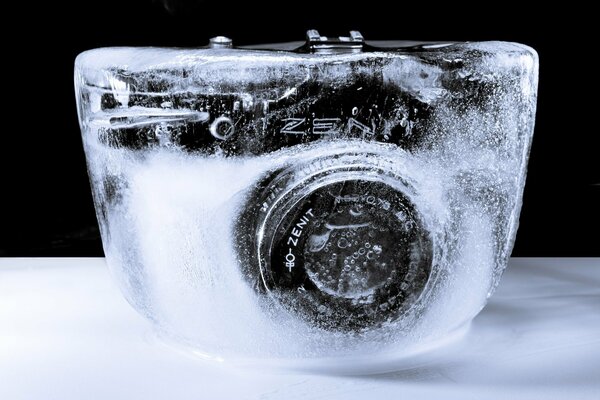 Zenith camera in ice on a black background