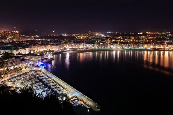 Illuminated embankment at night