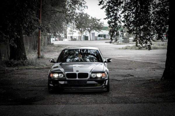 There is a beautiful car on a black and white background