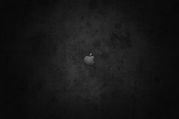 Logotipo de apple sobre fondo negro oscuro