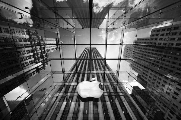 Skyscrapers with the Apple logo black and white filter