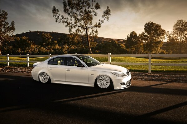 White beautiful car near the lawn