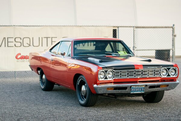 The black and red Plymouth of 1968 in all its splendor