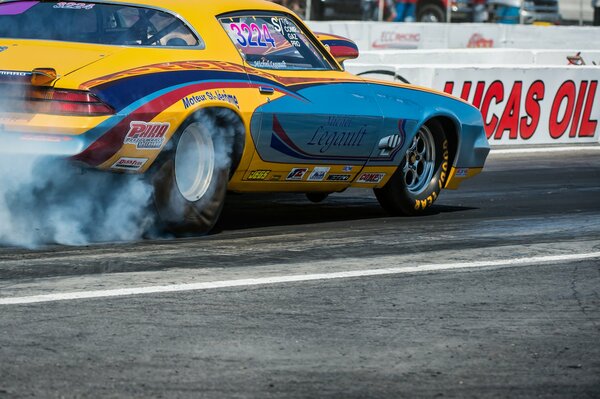 Chevrolet Camaro Muscle Car drifts with rear wheels