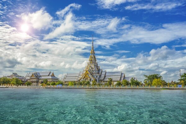 Temple on the embankment in Thailand. landscape