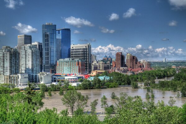 Panorama of Canadian high-rise buildings across the river