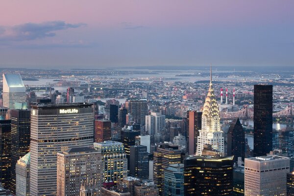 Evening city with beautiful high-rises