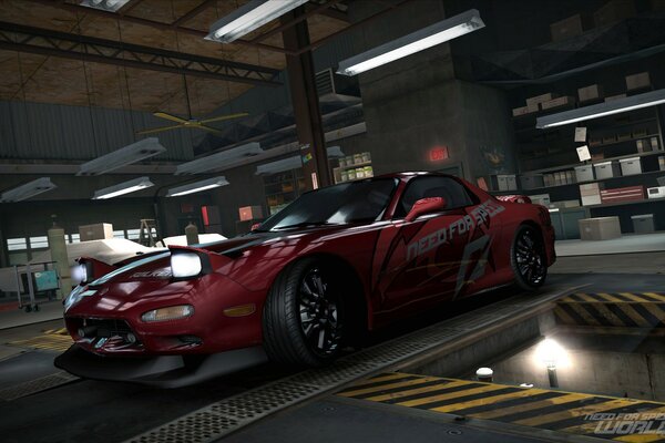 Czerwona Mazda zaparkowana w garażu