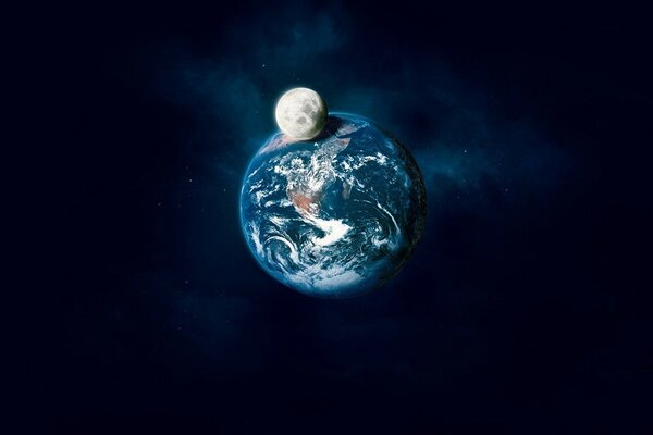 Земля и луна на темном фоне