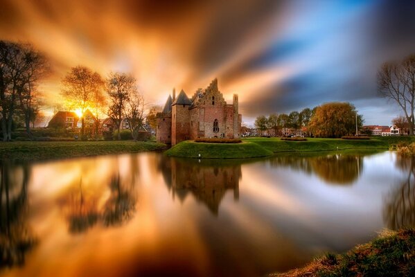 Reflection of the castle in the Netherlands lake