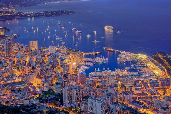 Lights on the pier in Monaco at night