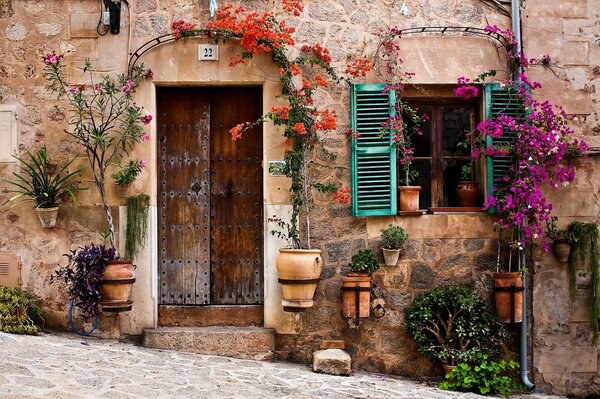 Old house decorated with flowers