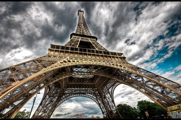 Eiffel Tower against a cloudy sky