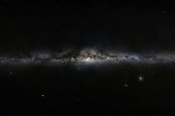 Black cosmic nebula against the background of stars