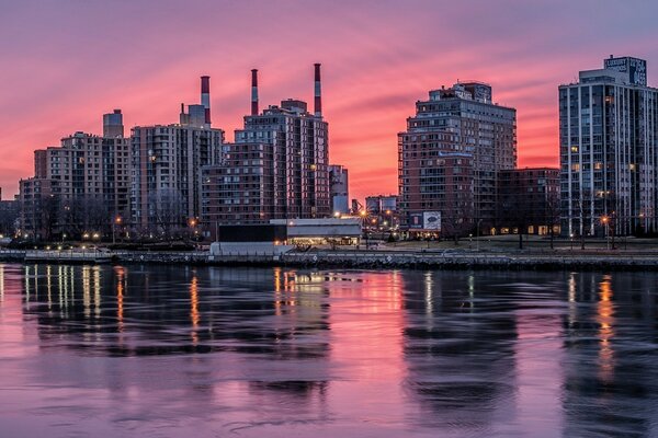 New York on the background of sunset and night lights