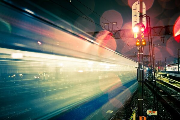 Railway glare at night in Tokyo