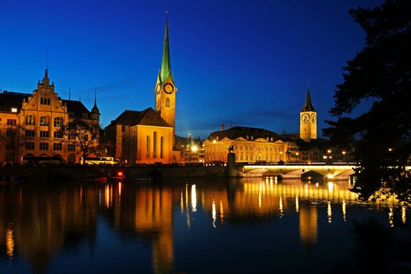 River in the night city of Zurich in Switzerland