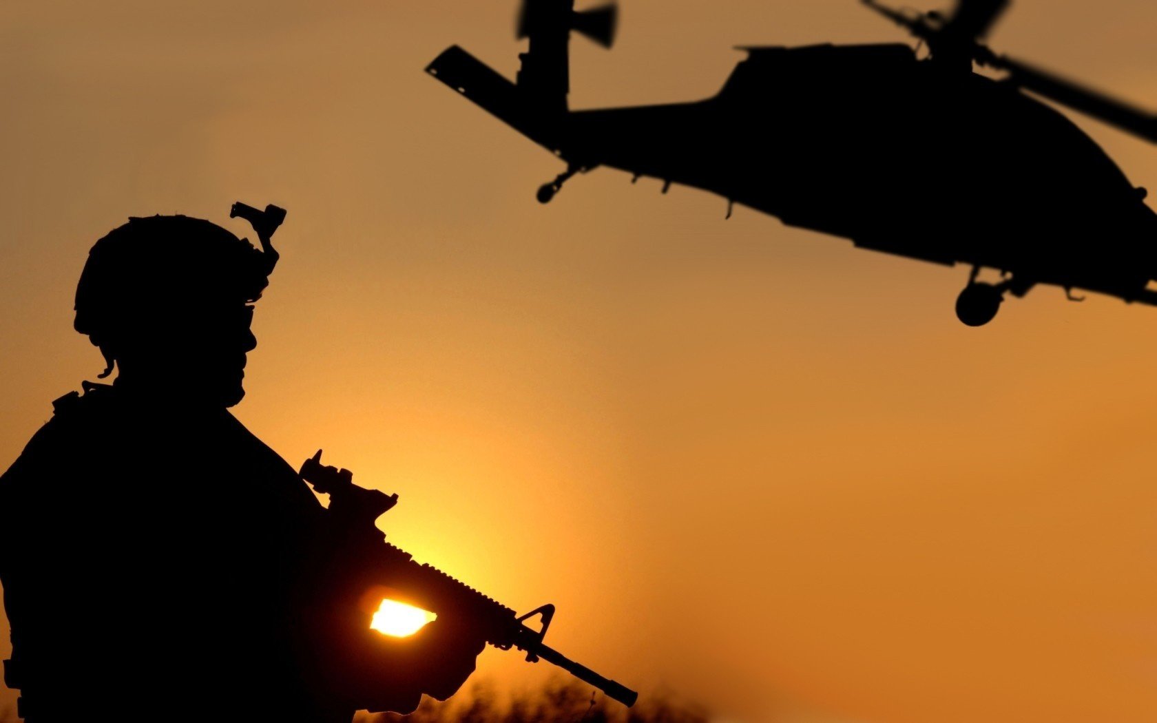 the silhouette of a soldier the sunset cowboy with rifle cargo helicopter scene from the movie avatar silhouette of girl at sunset helicopter black war weapons the sun rifle military equipment military aircraft