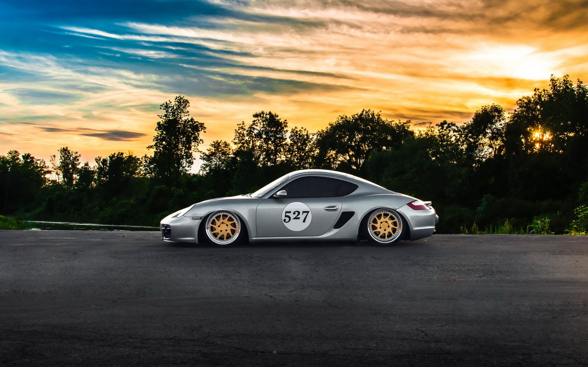 porsche cayman voiture position coucher de soleil