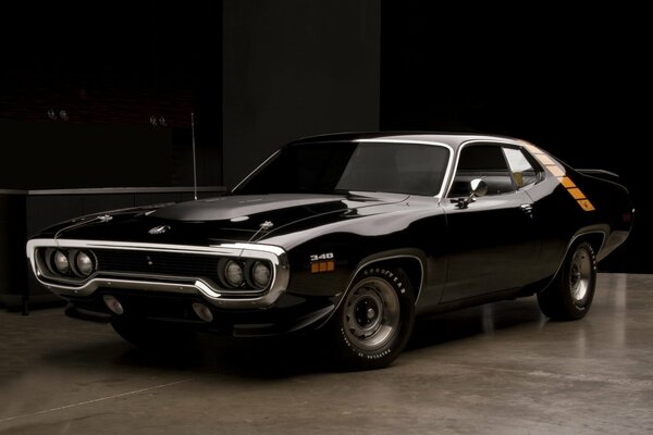 The 1976 Plymouth Road car is black