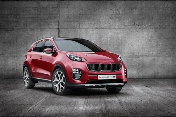 Czerwona kia sportage w studio