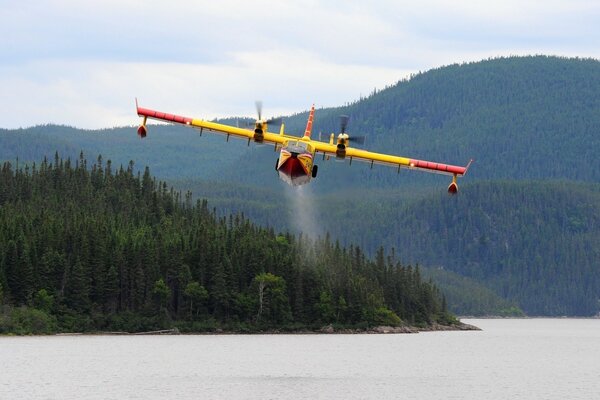 Take-off of an airplane in a mountainous area from the water