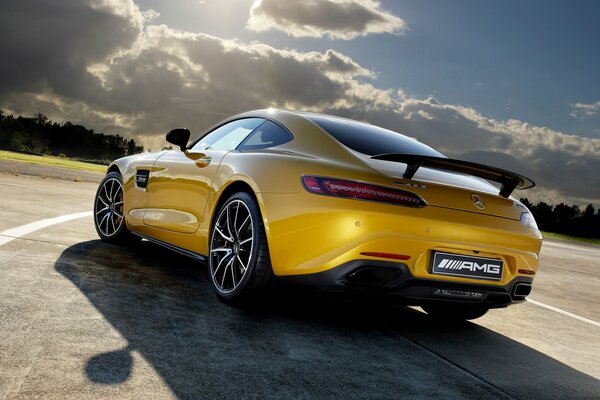 Bright yellow Mercedes 2015 - rear view