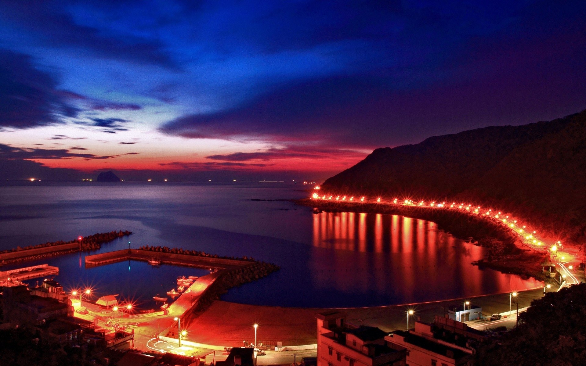 edificio agua mar noche