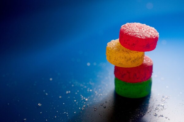 Sweet candies on a dark table