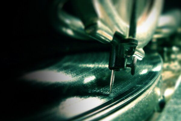 Macro photography of a needle on a music record