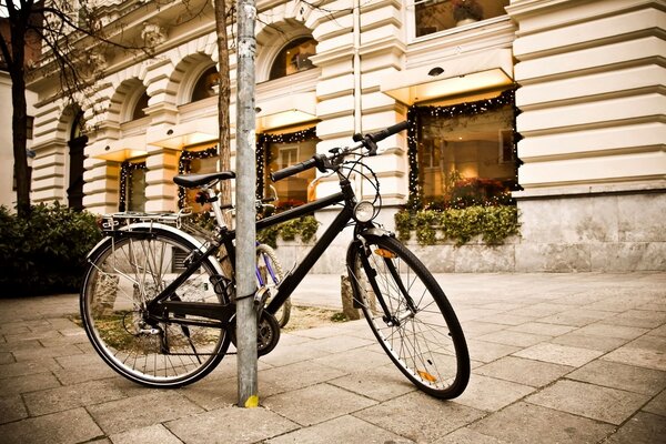 A lonely bike on the city sidewalk