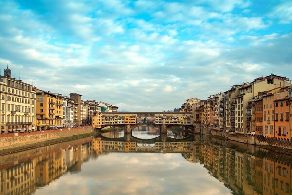 A river in Florence. Around the river houses