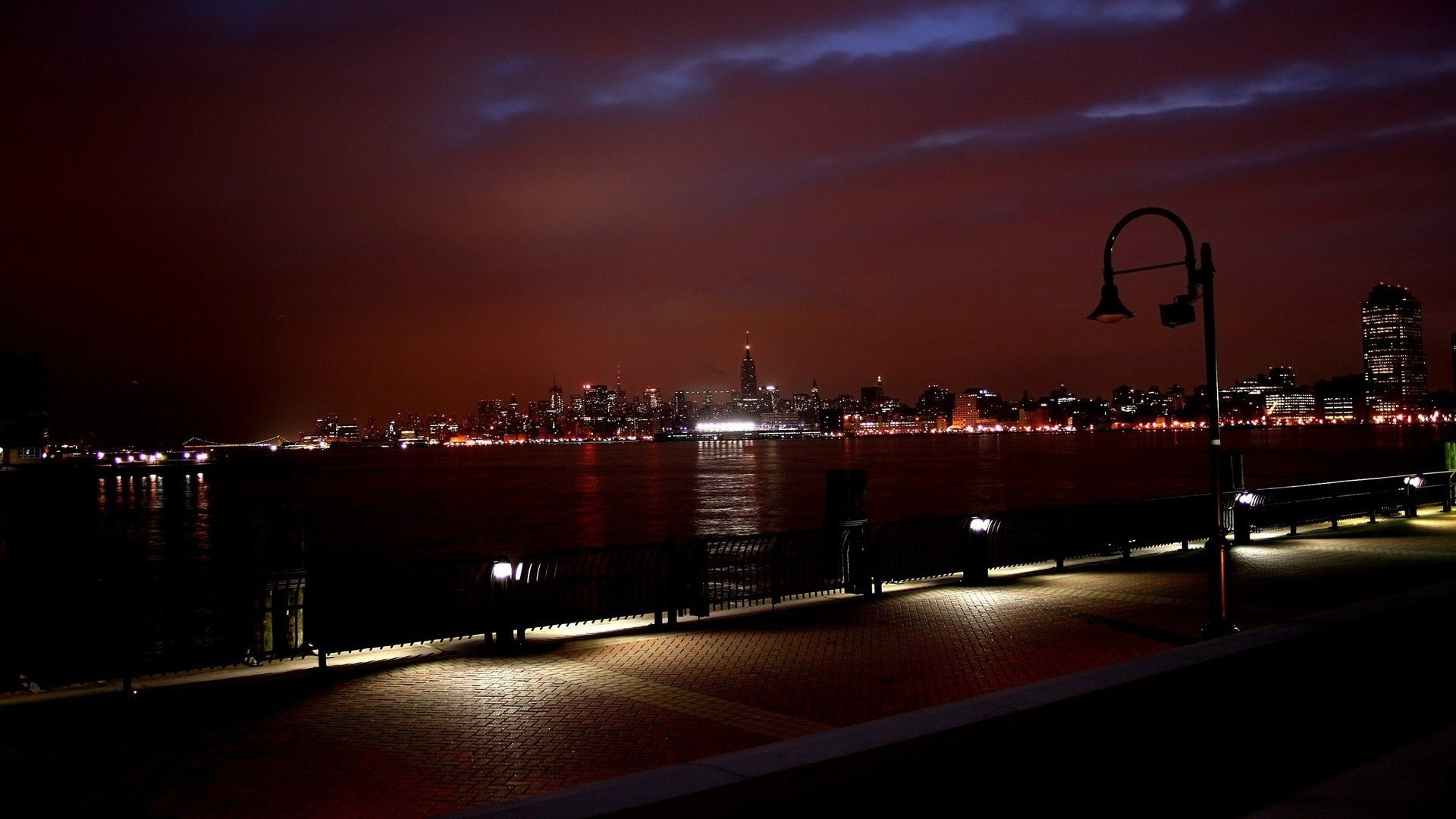 luz rojo noche río nueva york ciudad