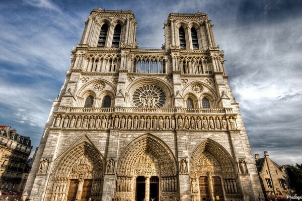 Notre Dame Cathedral on the background of clouds