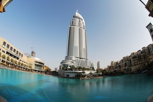 Huge building in Dubai near an outdoor swimming pool