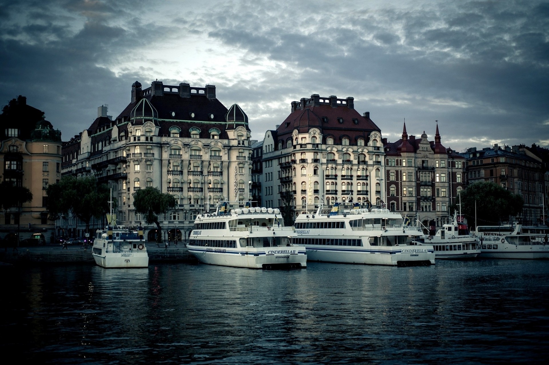 river stockholm sweden city night building trams embankment house